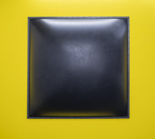 Black, air-filled square, curved outward, in a black frame.