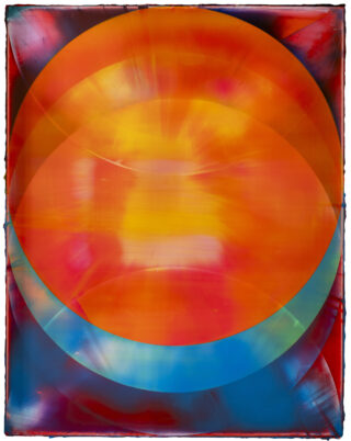 Abstract image featuring a large orange-red circle against a multicolored blurred background.